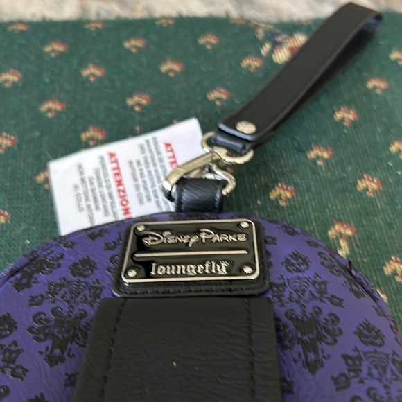 Disney’s haunted mansion, wristlet, purple, and black has a place foot belt too - Picture 10 of 10